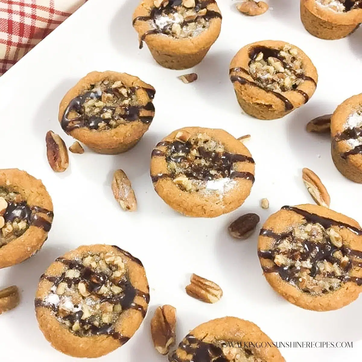pecan pie cookie cups made with pumpkin spice cookie mix.