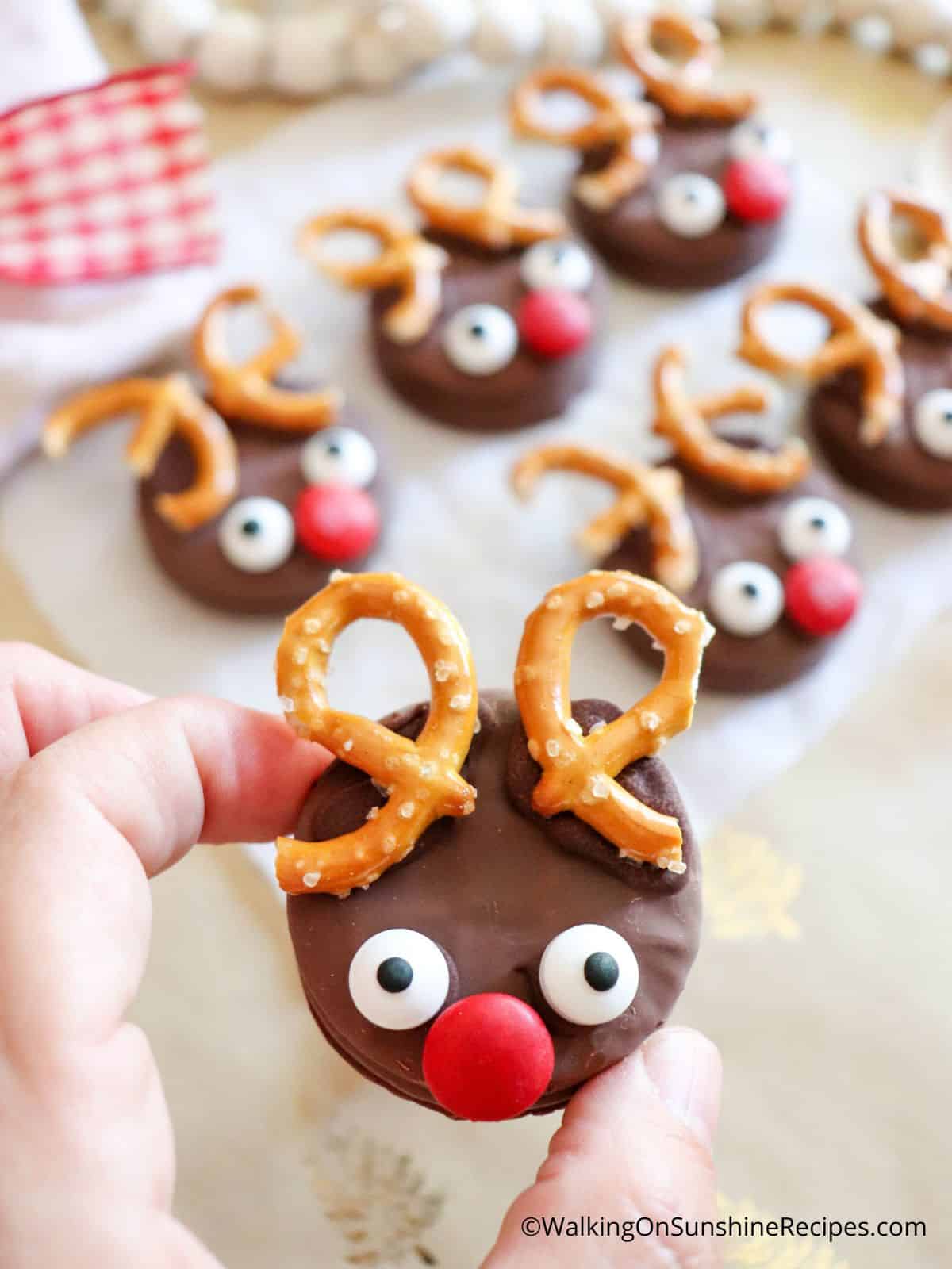 Reindeer cookies made with chocolate covered peanut butter cookies.