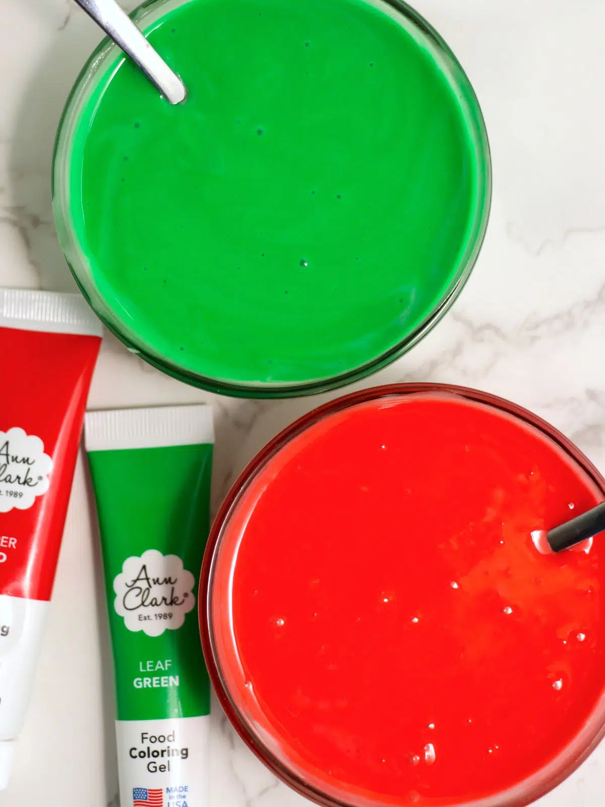 green and red powdered sugar frosting for sugar cookies.