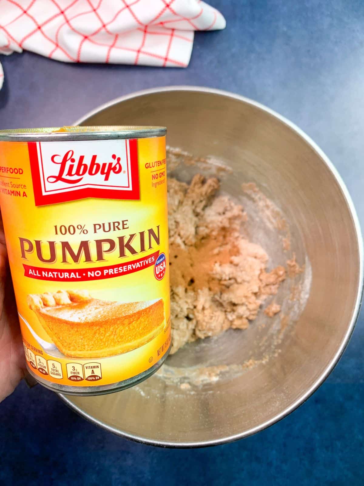 Add canned pumpkin puree to cake batter.