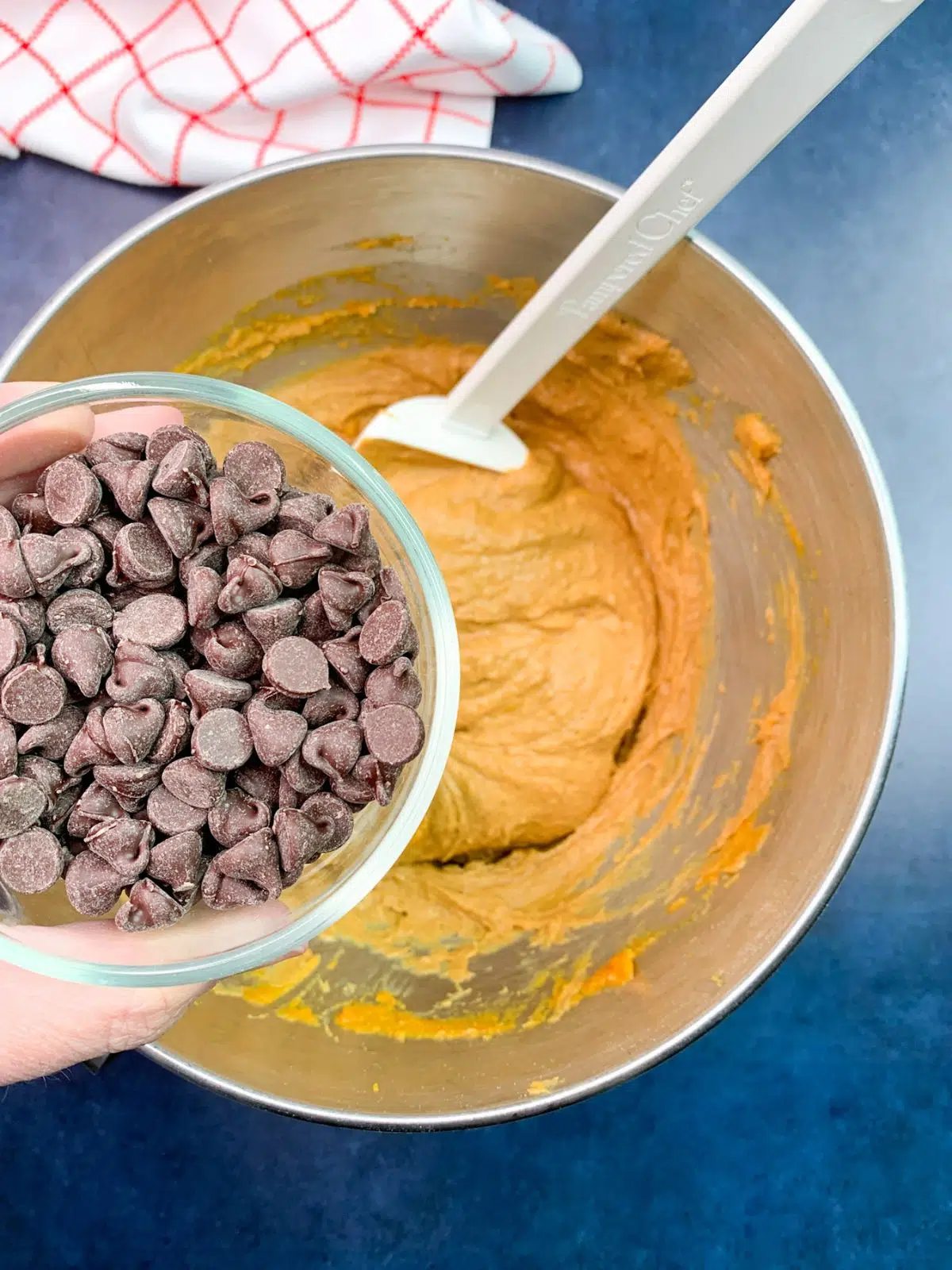 add chocolate chips to cake mix batter. 