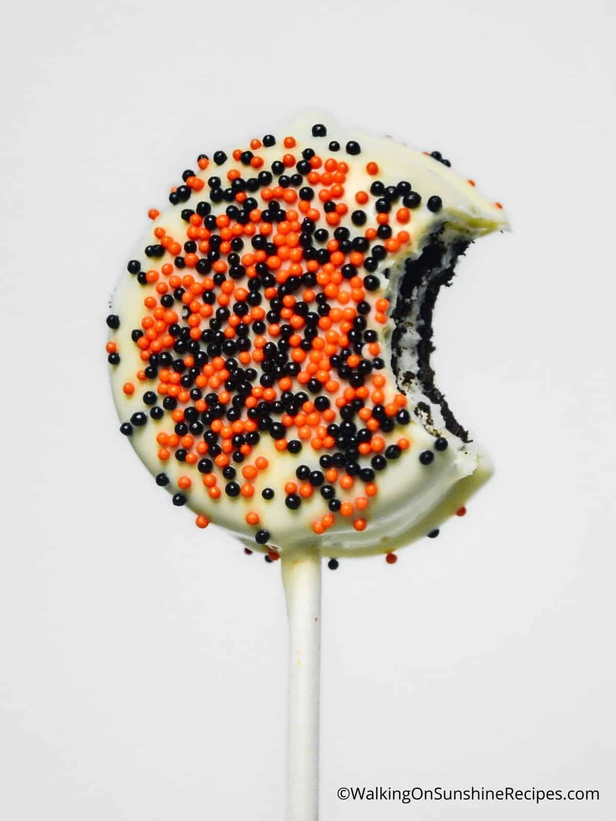 White chocolate covered Oreo on a stick.
