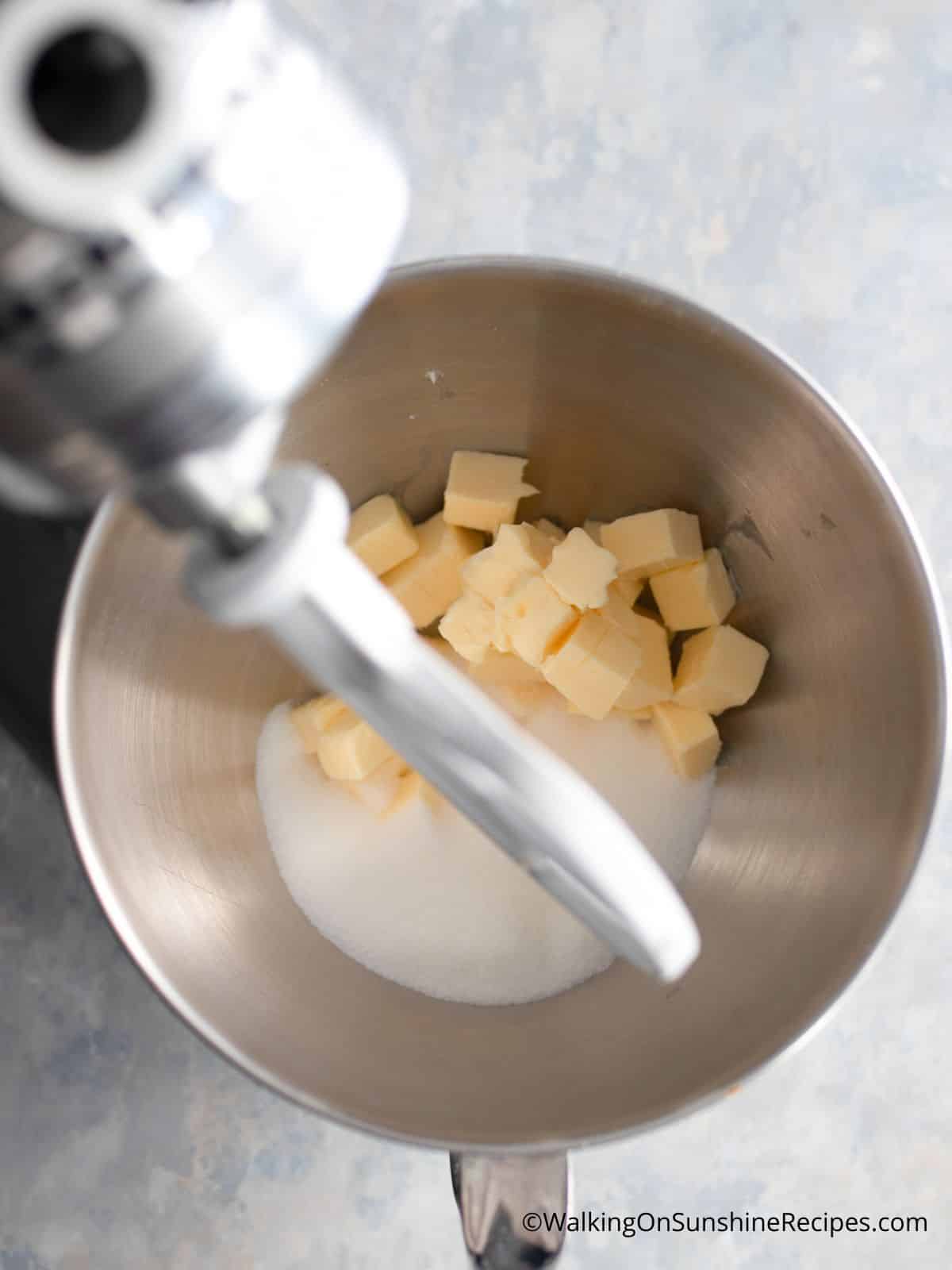 Cream butter and sugar together in mixing bowl.