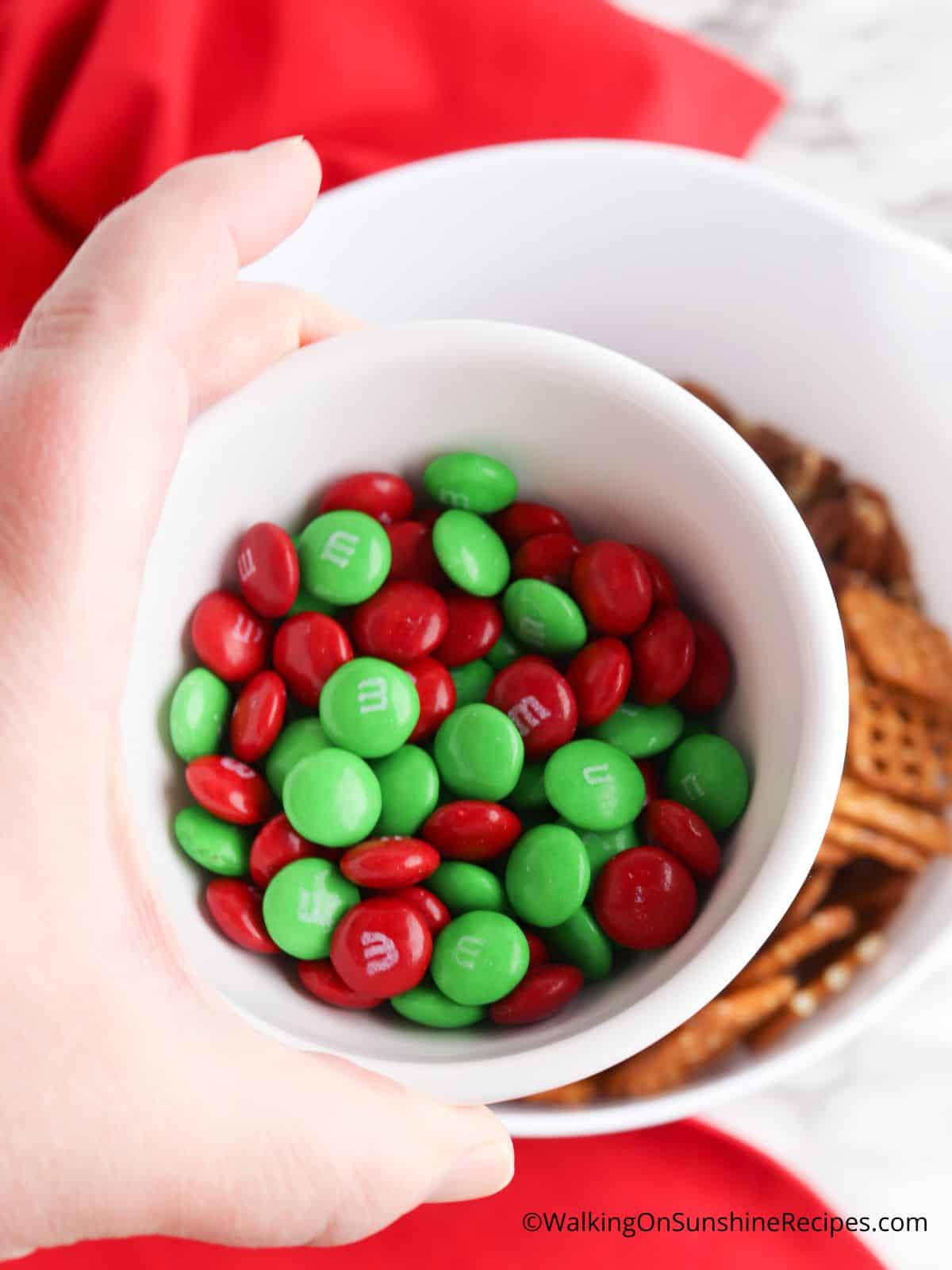 red and green m&m's in a bowl.