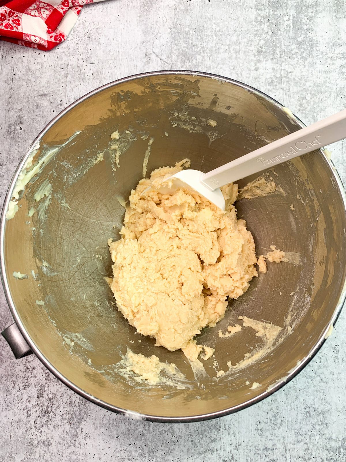 spritz cookie dough combined in mixing bowl.