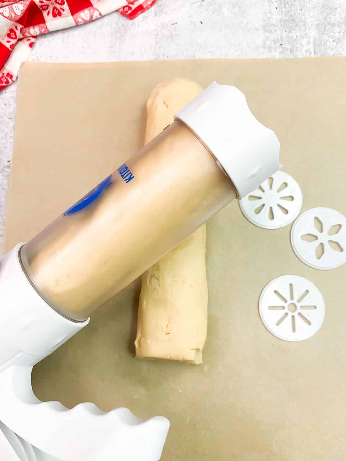 add dough to cookie press.