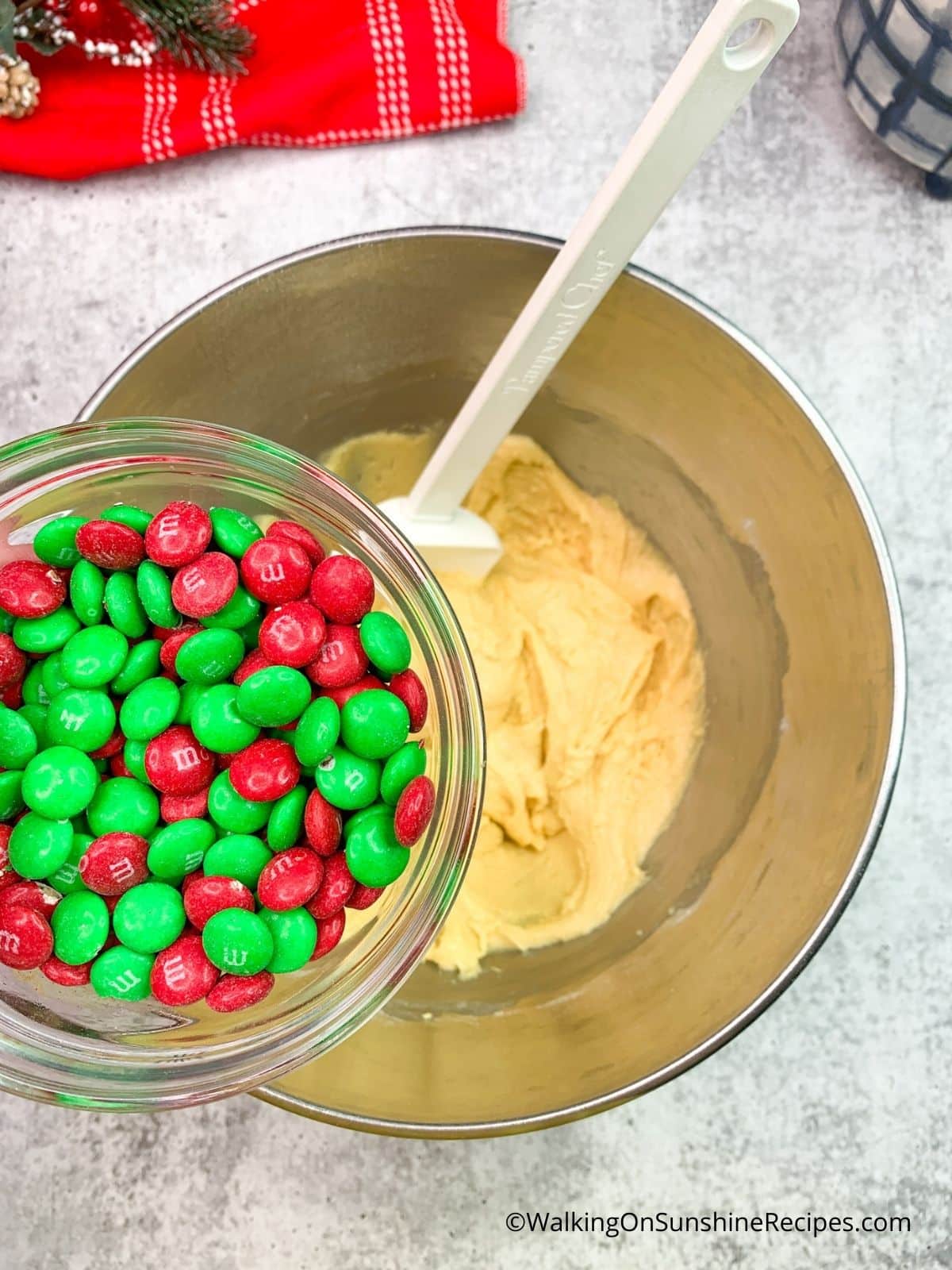 red and green m&ms over cake mix.