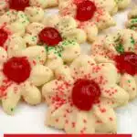 butter cookies with sprinkles and candied cherries.