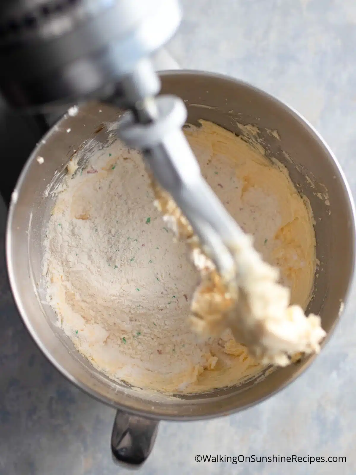 Combine dry ingredients with butter and sugar.