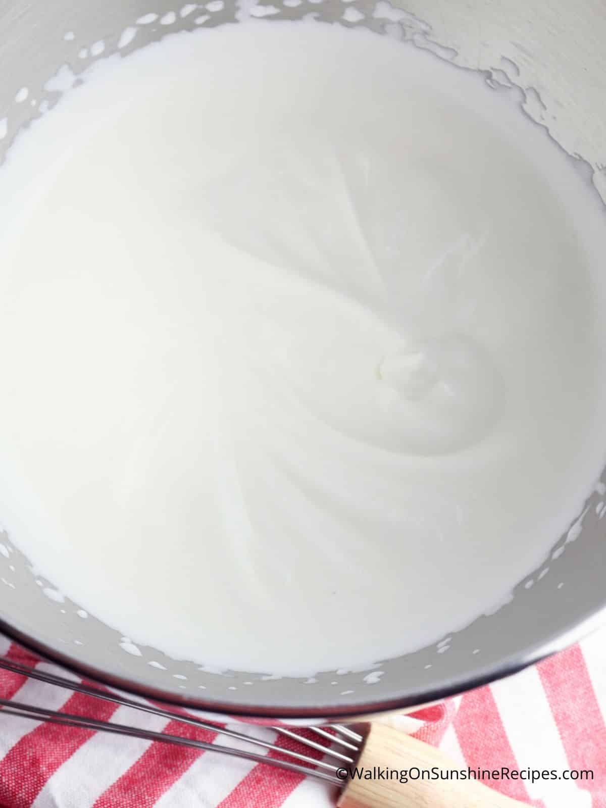 whipping cream in bowl.