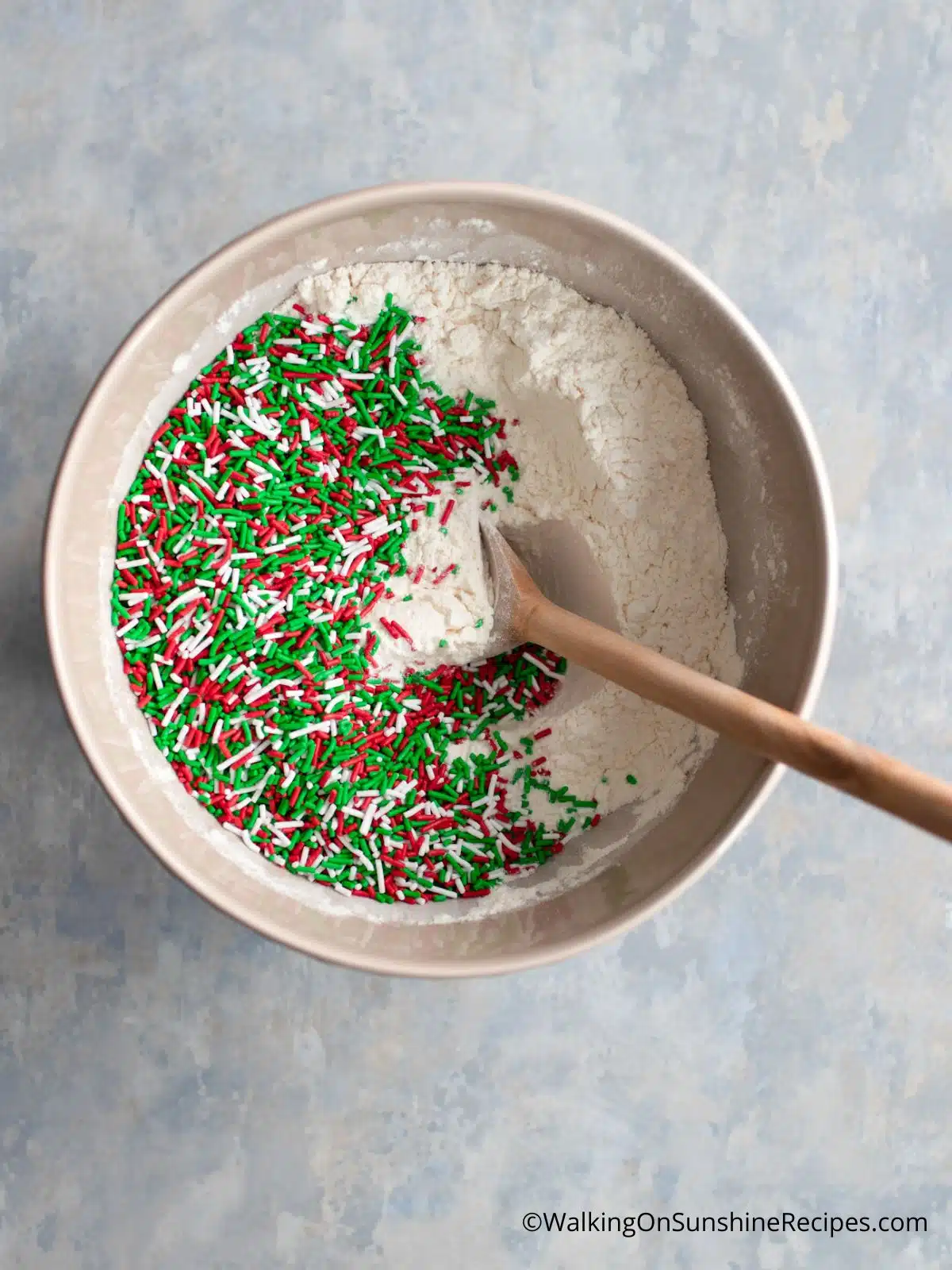 combine flour with sprinkles.