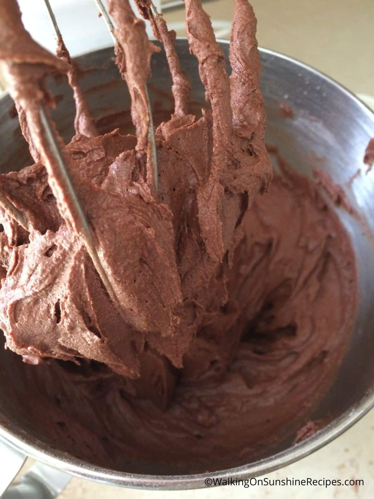 homemade chocolate frosting in bowl.
