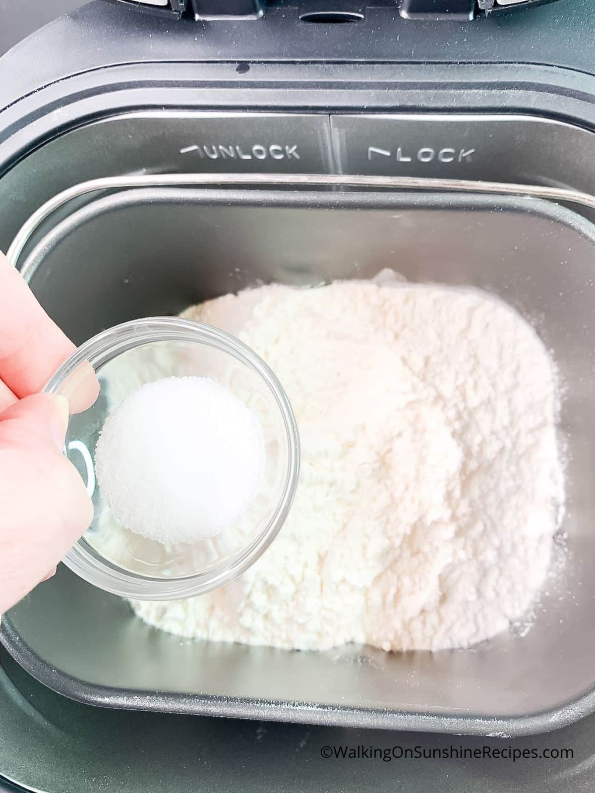Add salt to bread machine.