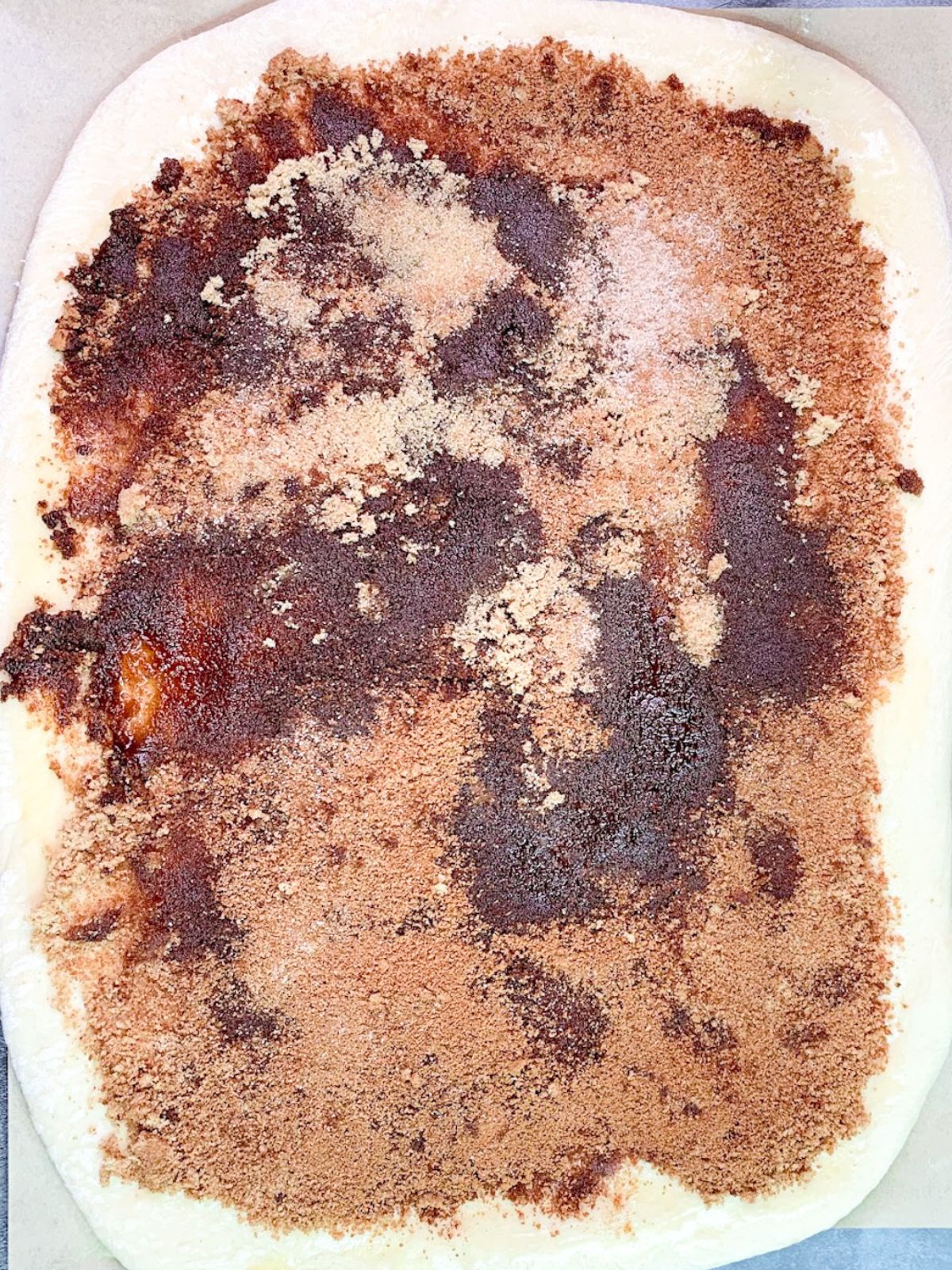 spread cinnamon and sugar mixture evenly over bread machine dough.