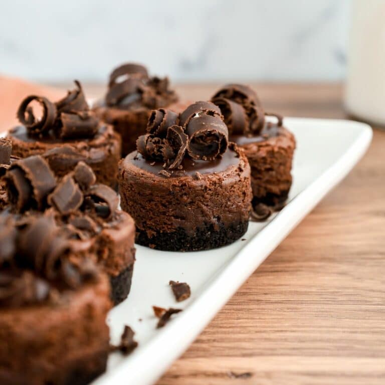 chocolate cheesecake on a white plate.