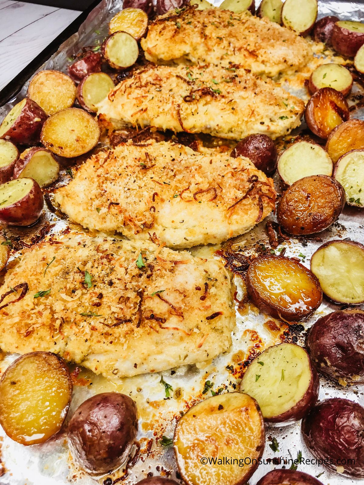 sheet pan chicken and red potatoes.