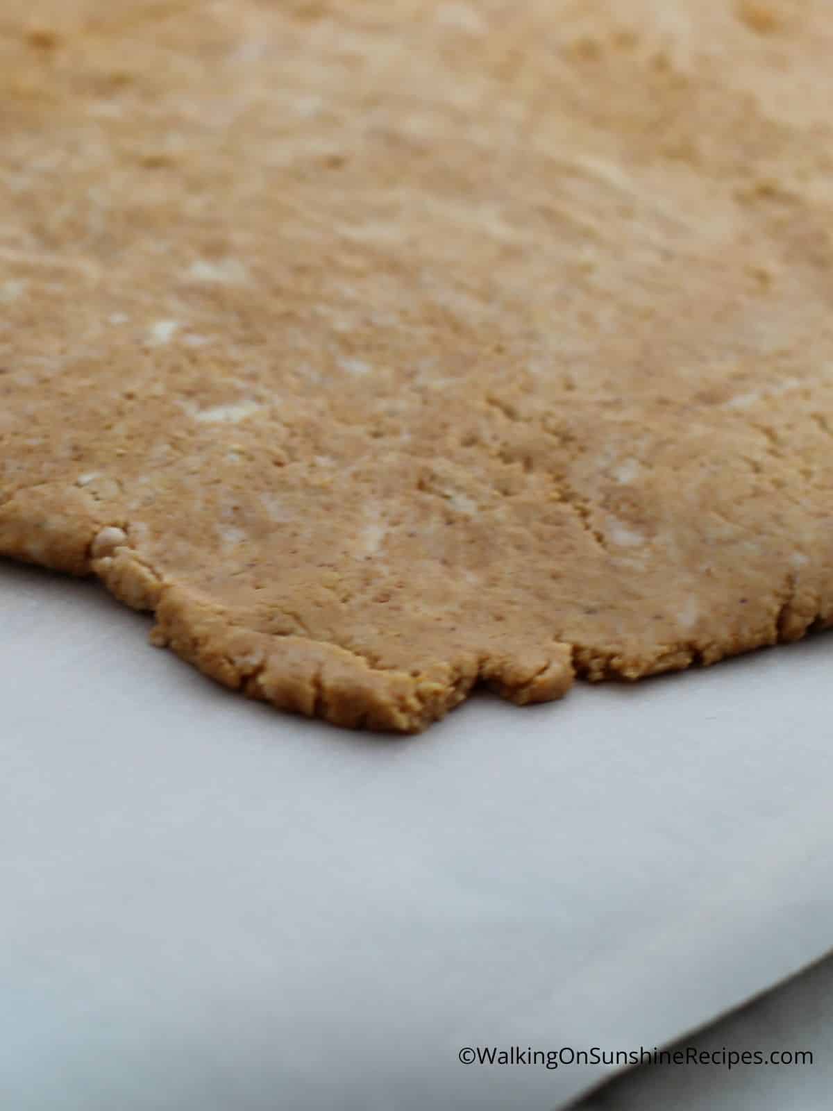 roll out dough for peanut butter hearts.