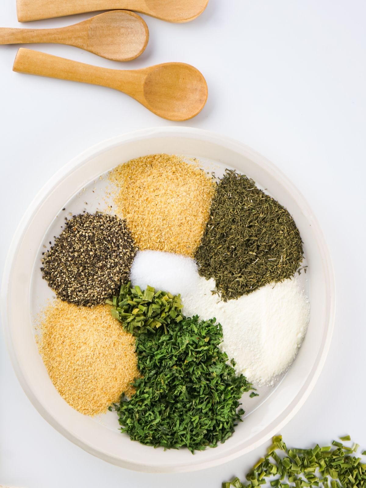 spices on plate for homemade ranch dressing mix.