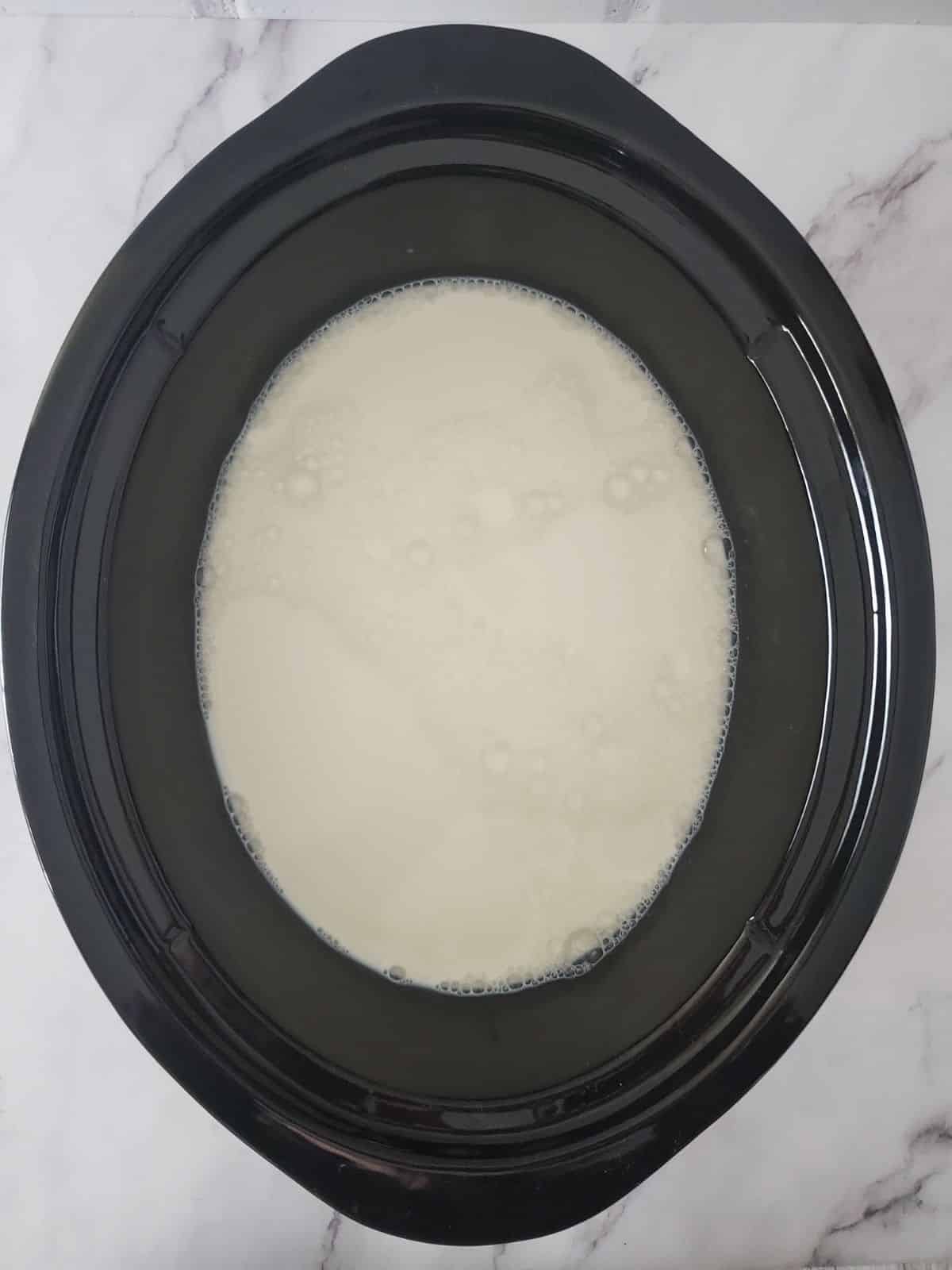 Milk in crock pot for homemade yogurt.