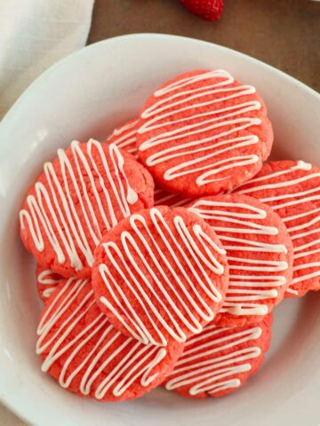strawberry cake mix cookies with melted white chocolate.