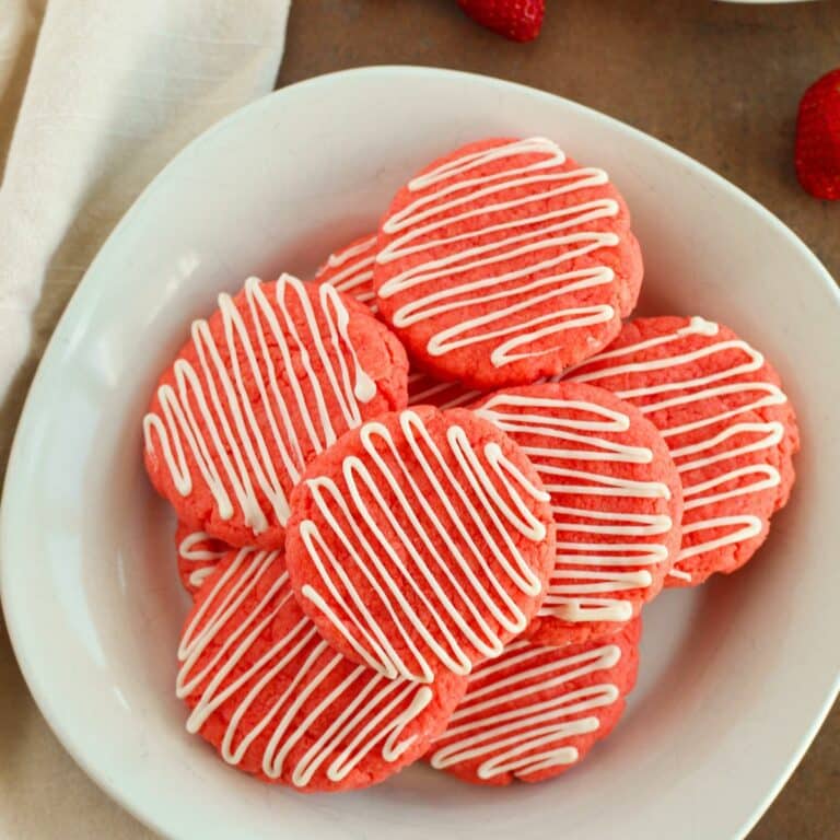 strawberry cake mix cookies with melted white chocolate.