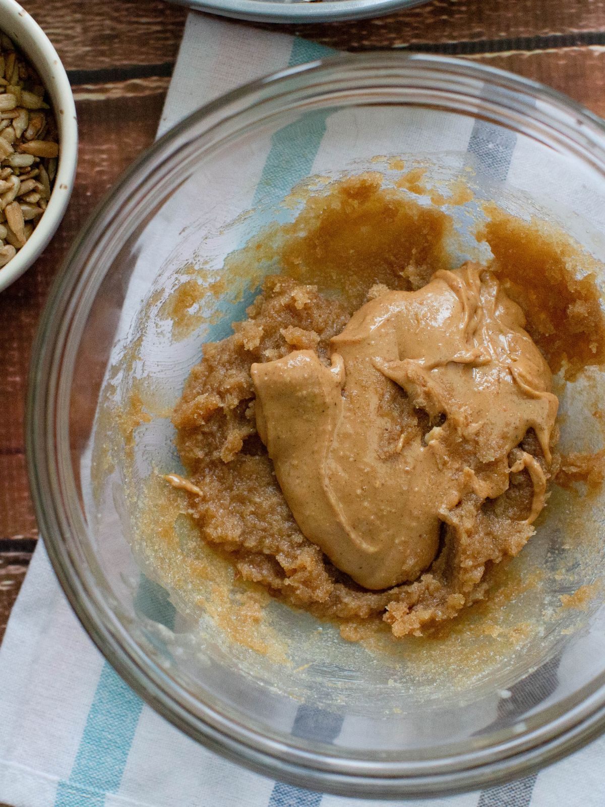 combine peanut butter in bowl with other wet ingredients.