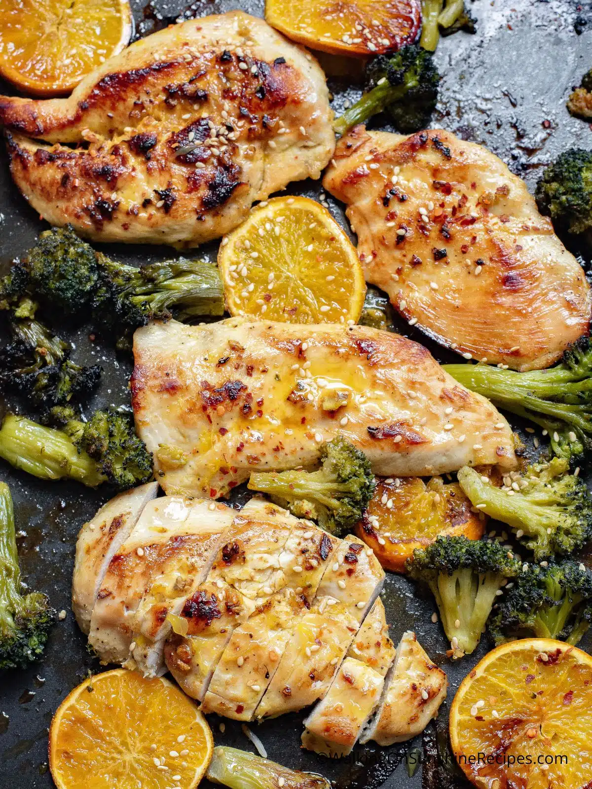 Sheet Pan Chicken Cutlets with broccoli and orange slices