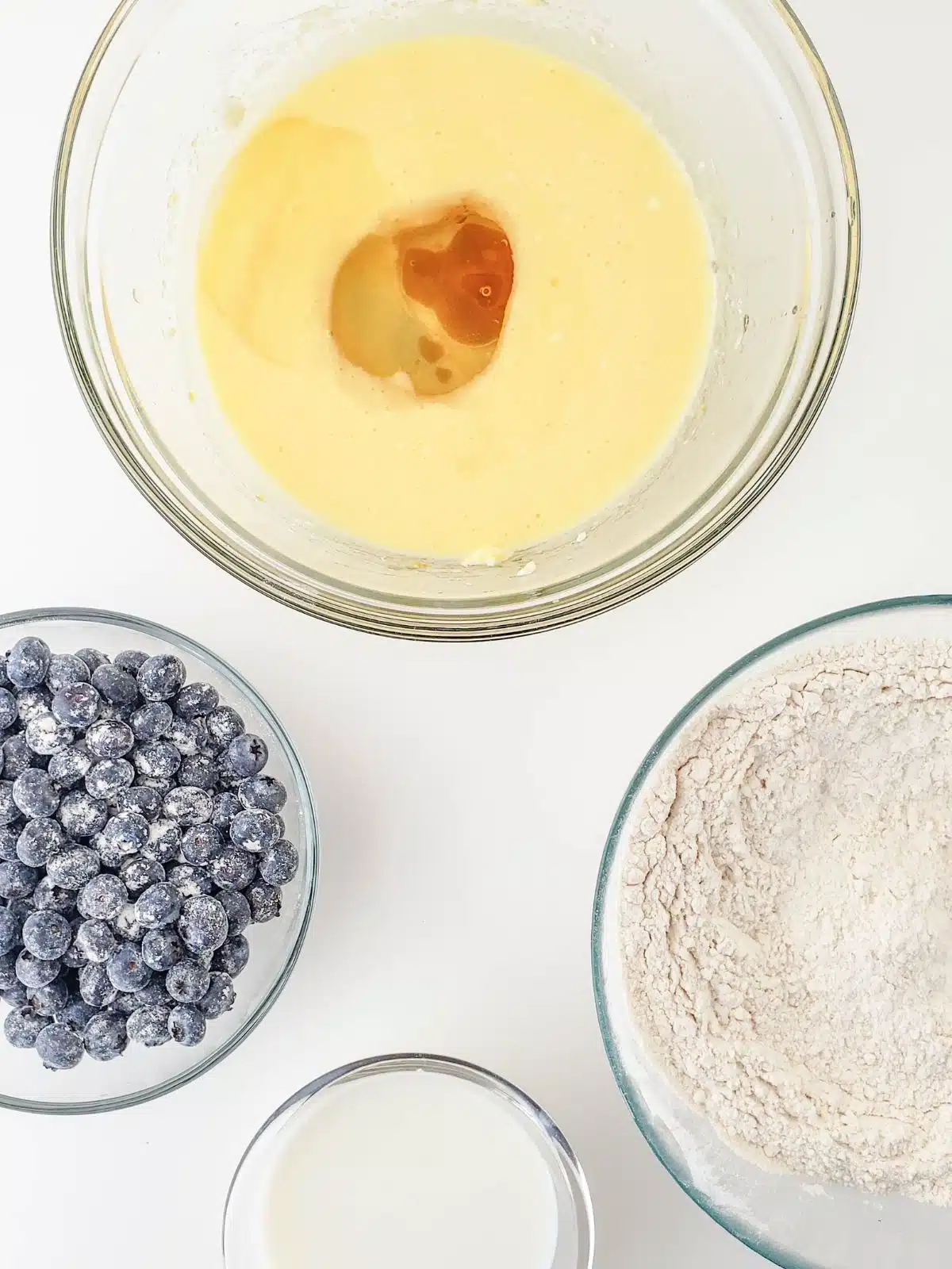 combine ingredients together for blueberry muffins.