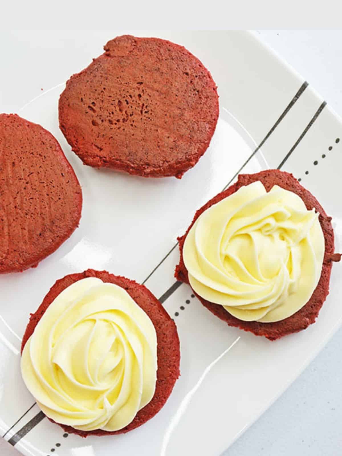 red velvet cookies with cream cheese frosting.