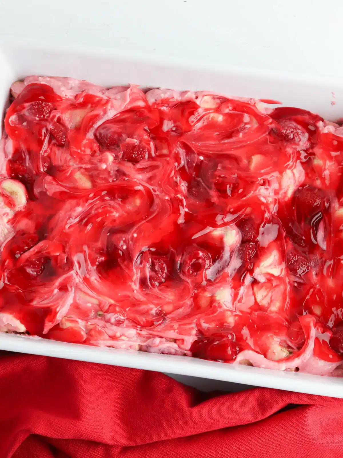 Remaining strawberry pie filling added to the casserole dish