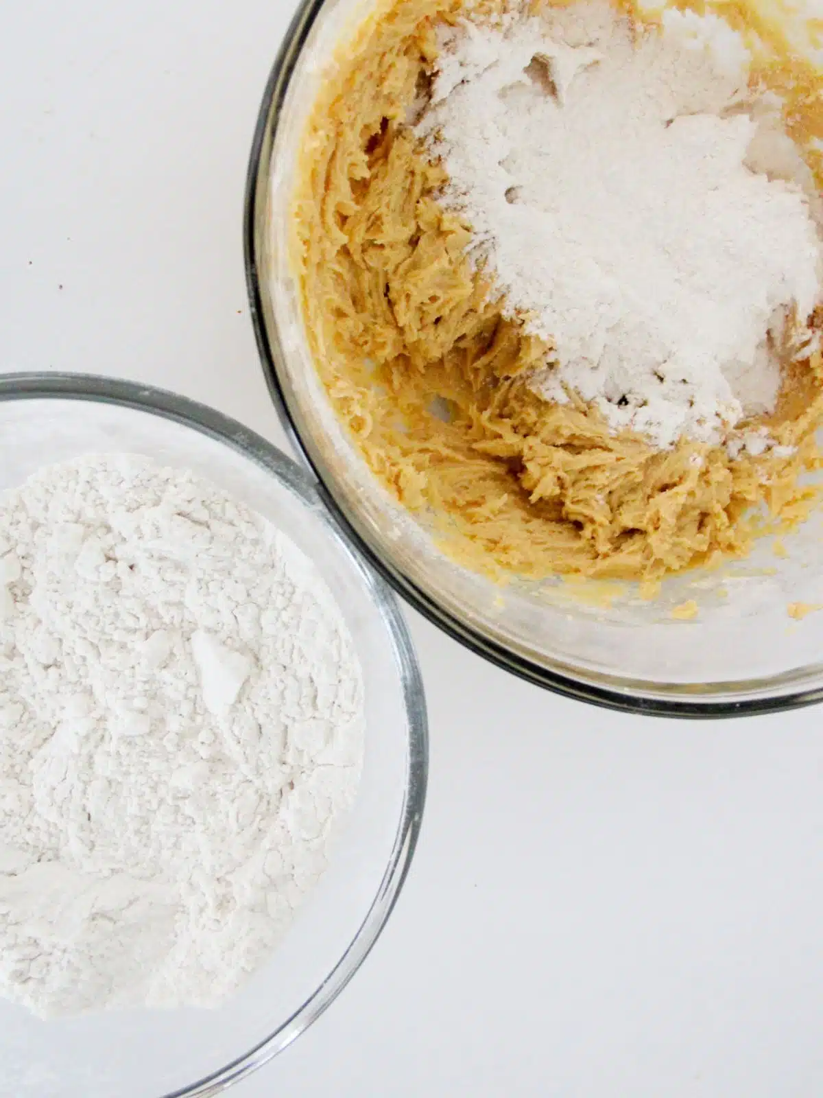 flour mixture in one bowl and brown sugar, butter mixture in another bowl.