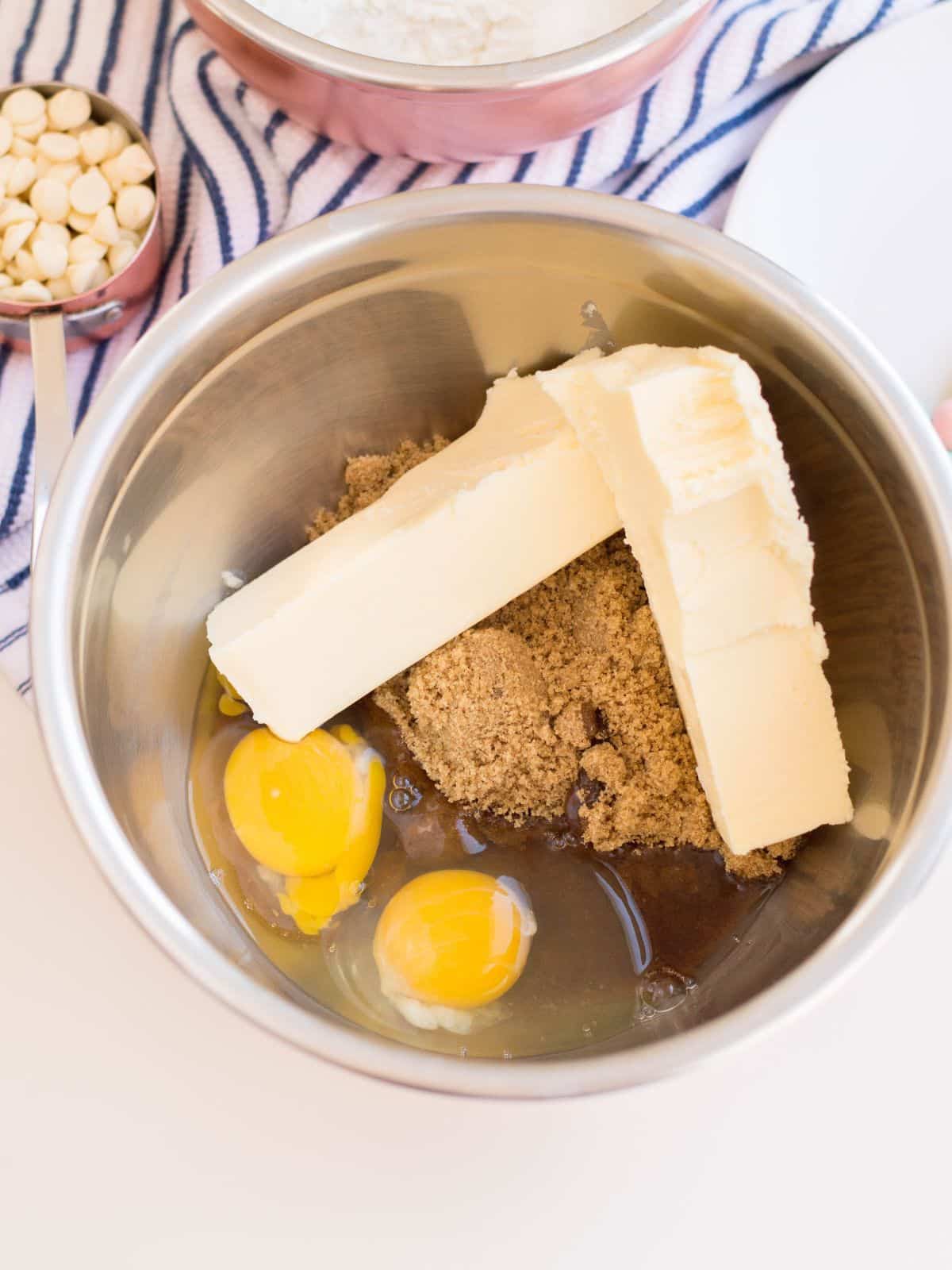2 sticks of butter, 2 eggs, brown sugar and vanilla in mixing bowl.