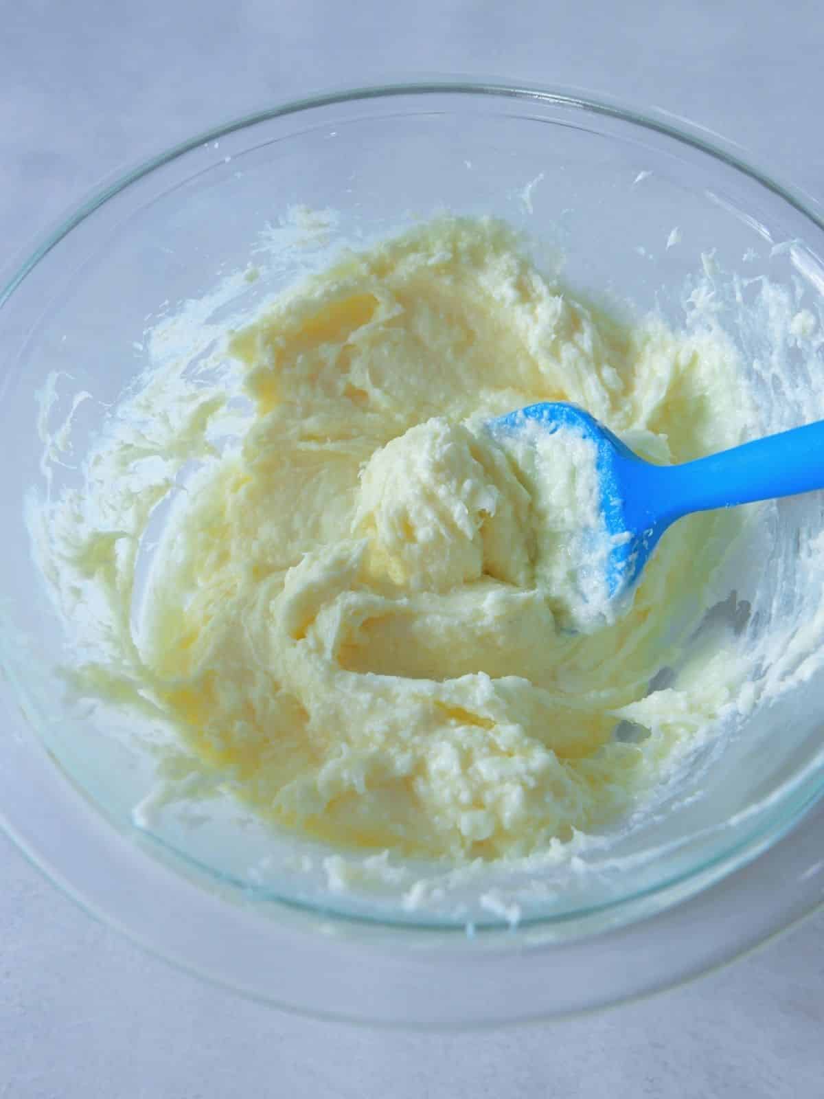 cream cheese frosting in bowl.