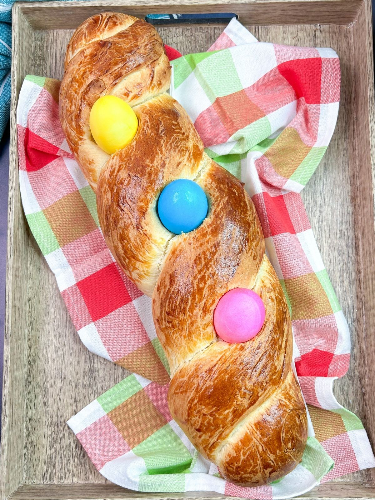 Easter bread baked with colored eggs.