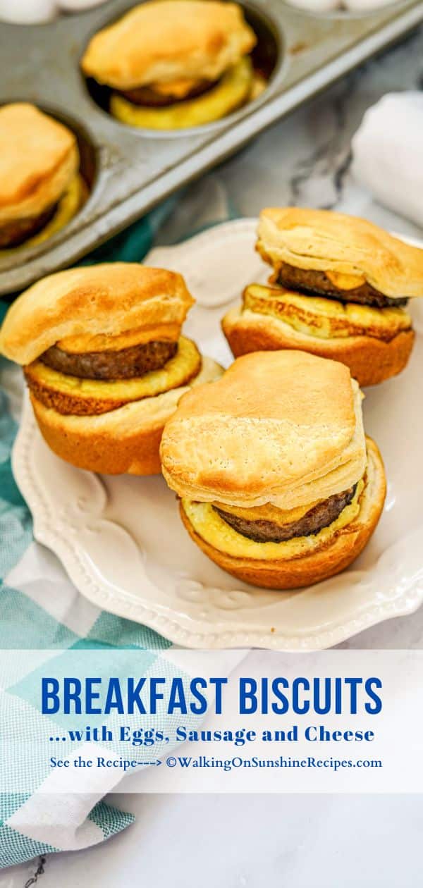 Breakfast Biscuits with Eggs, Sausage and Cheese on white plate with aqua and white checked napkin.
