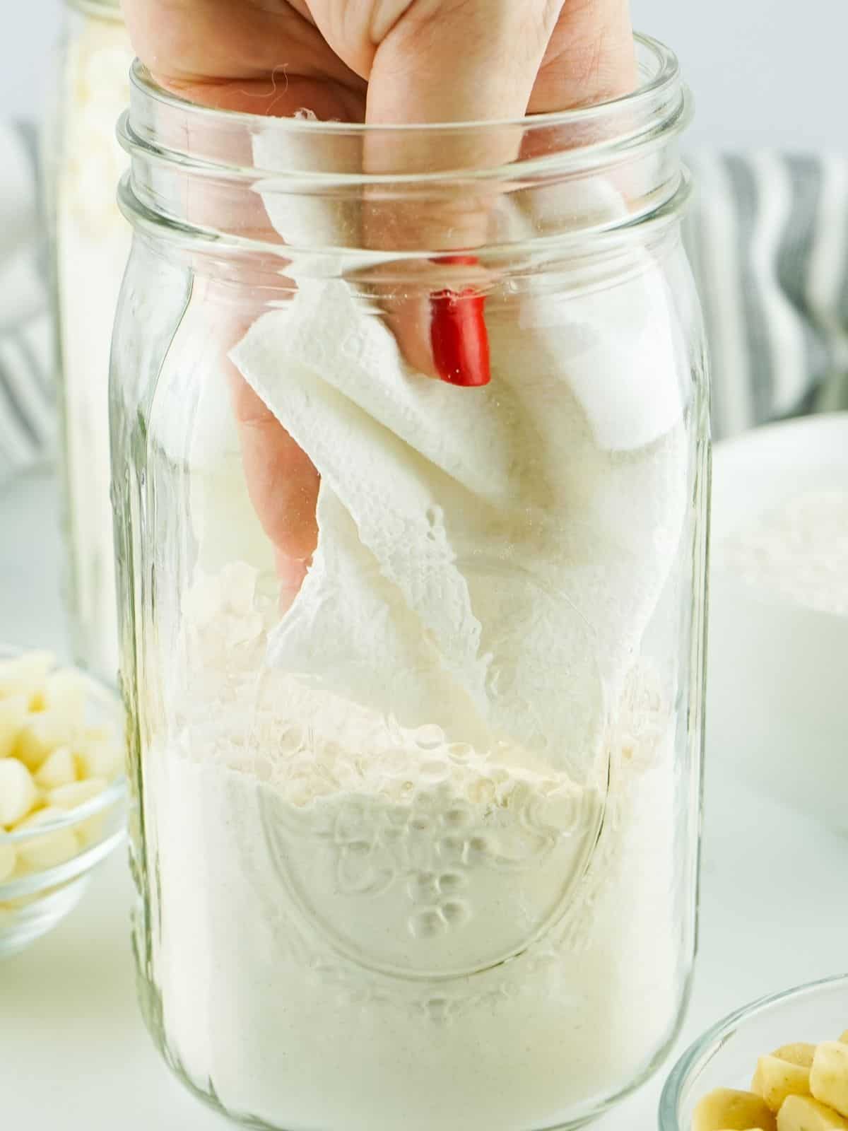 Clean inside of mason jar with cloth.