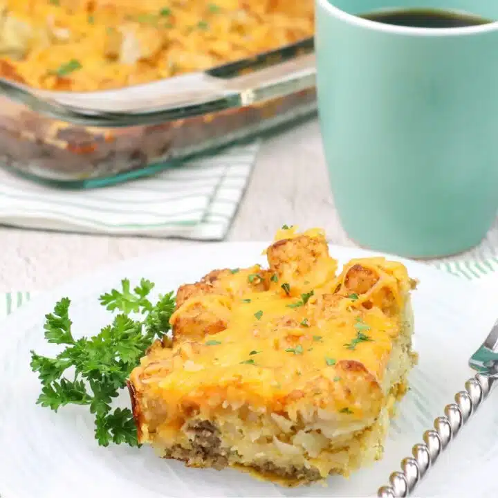 piece of breakfast casserole on plate with fork.
