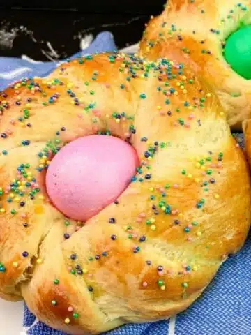 Closeup of Italian Easter Bread Individual Ring with egg in the center.
