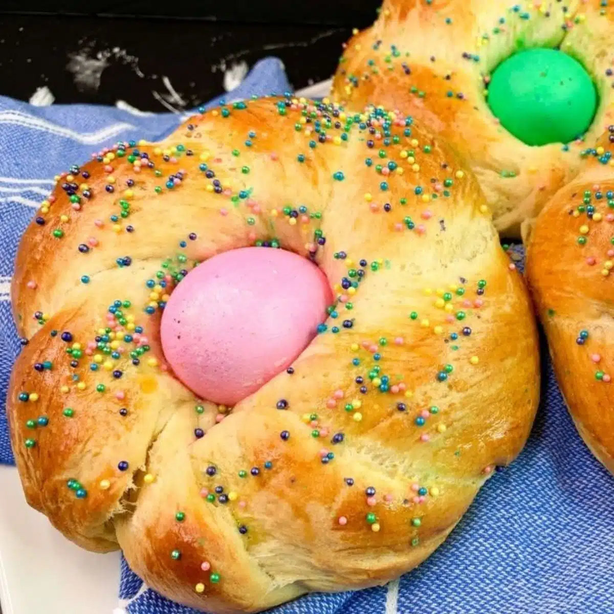 Closeup of Italian Easter Bread Individual Ring with egg in the center.