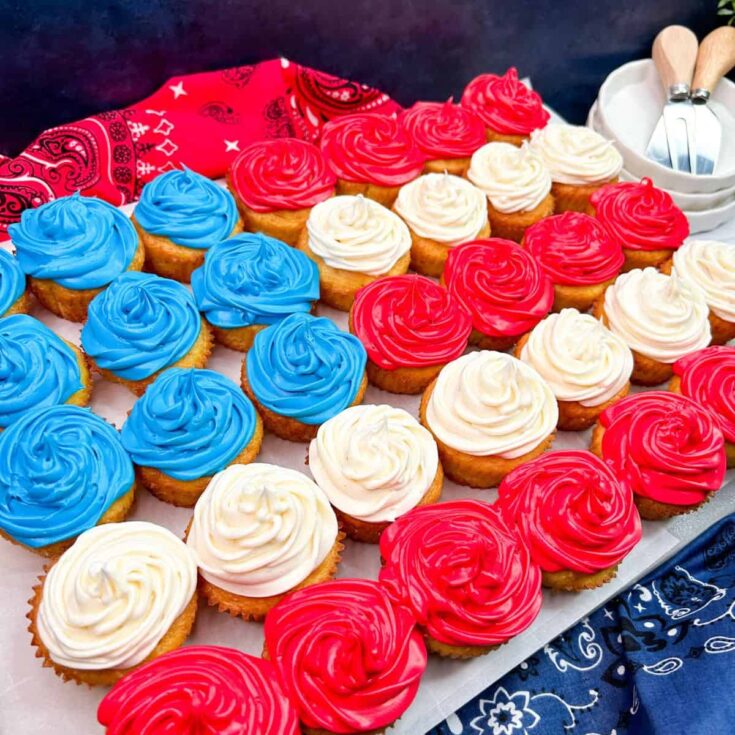 American flag cupcake cake on white board.