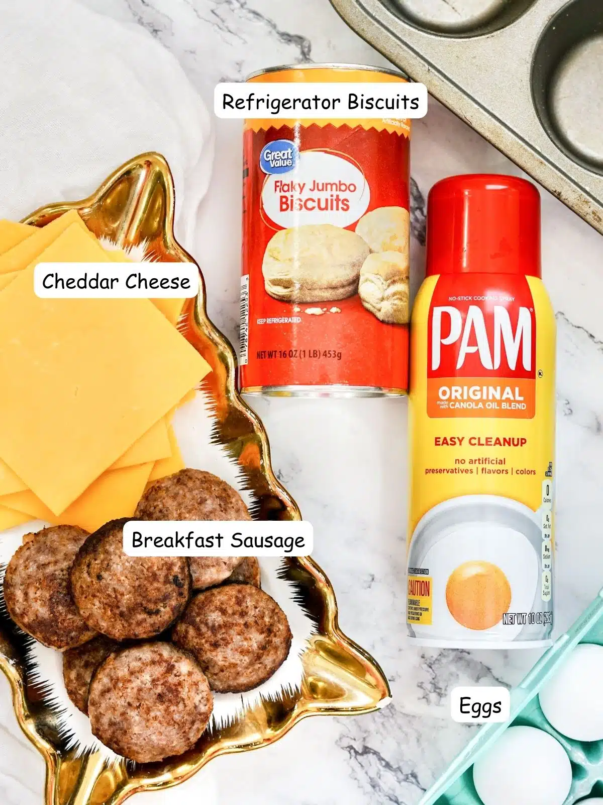 ingredients, refrigerator biscuits, sausage patties, eggs, cheese and Pam cooking spray.