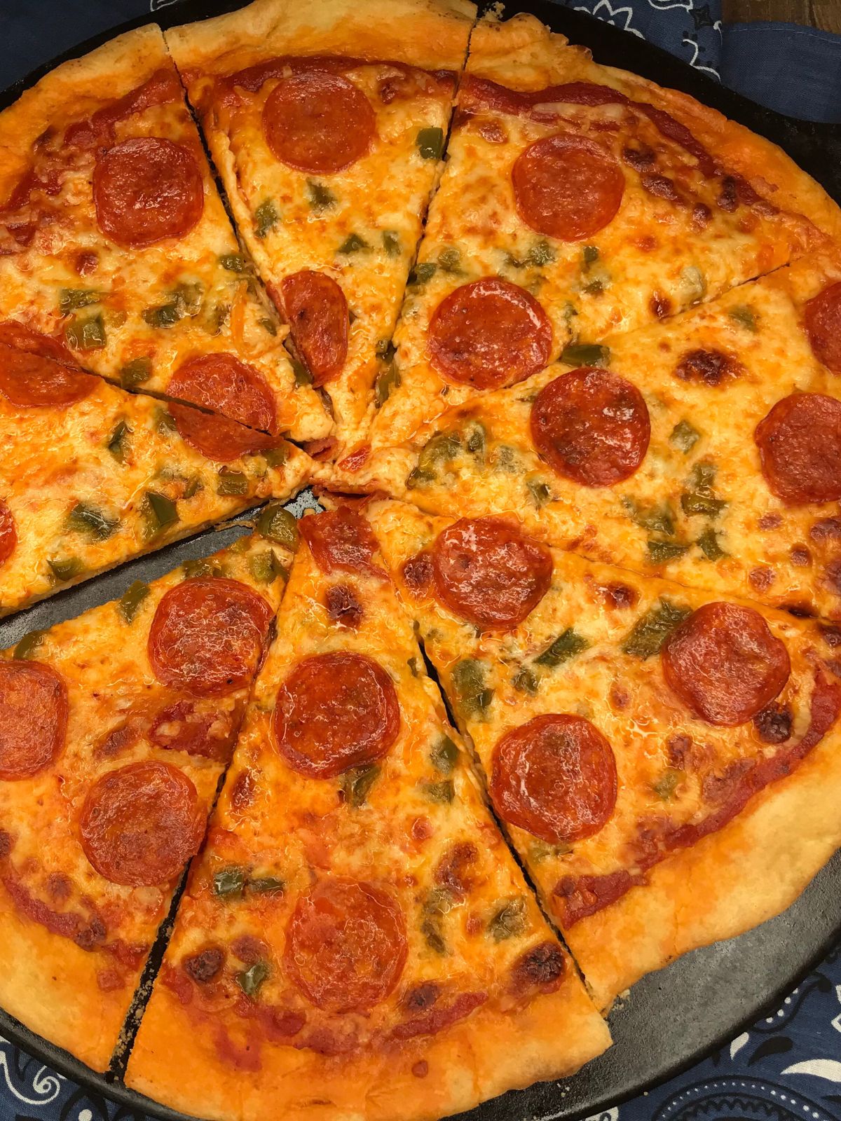 Baked and sliced pizza.