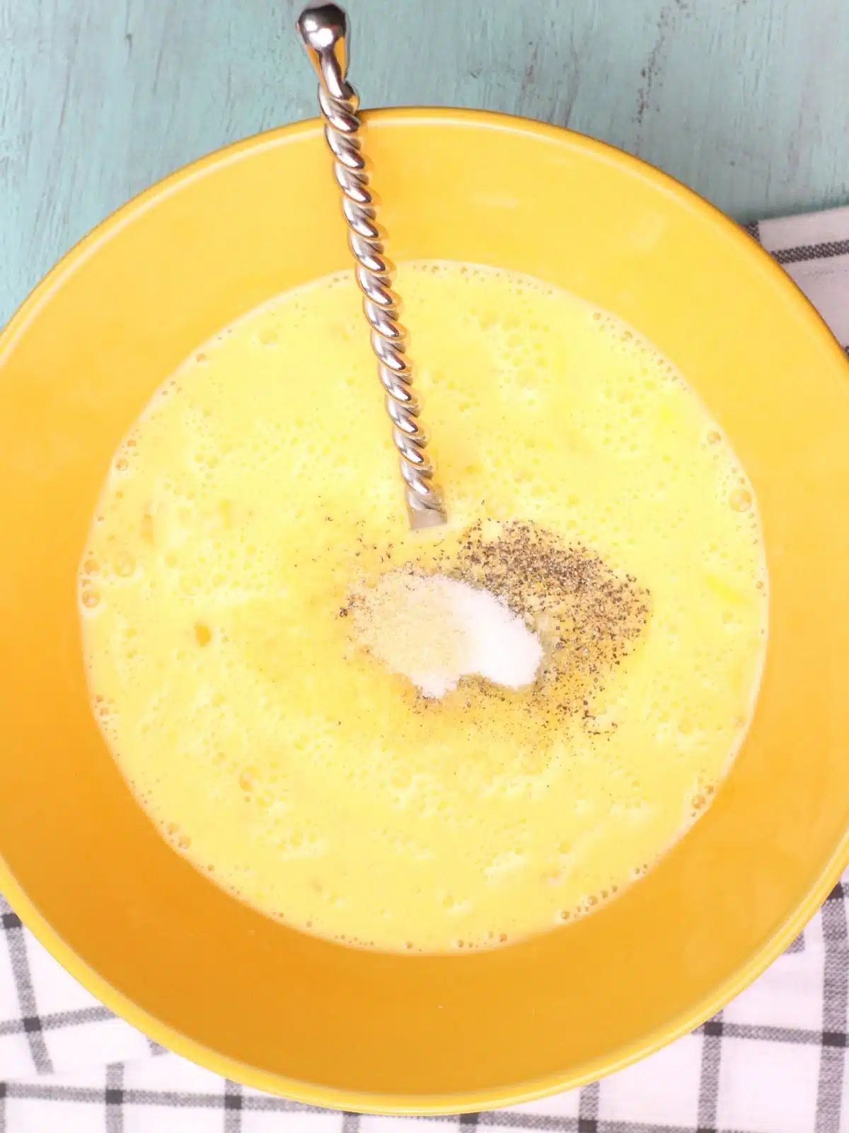 egg mixture in yellow bowl.