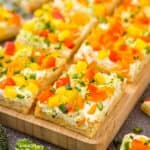 Crescent Roll Veggie Pizza on a wooden cutting board