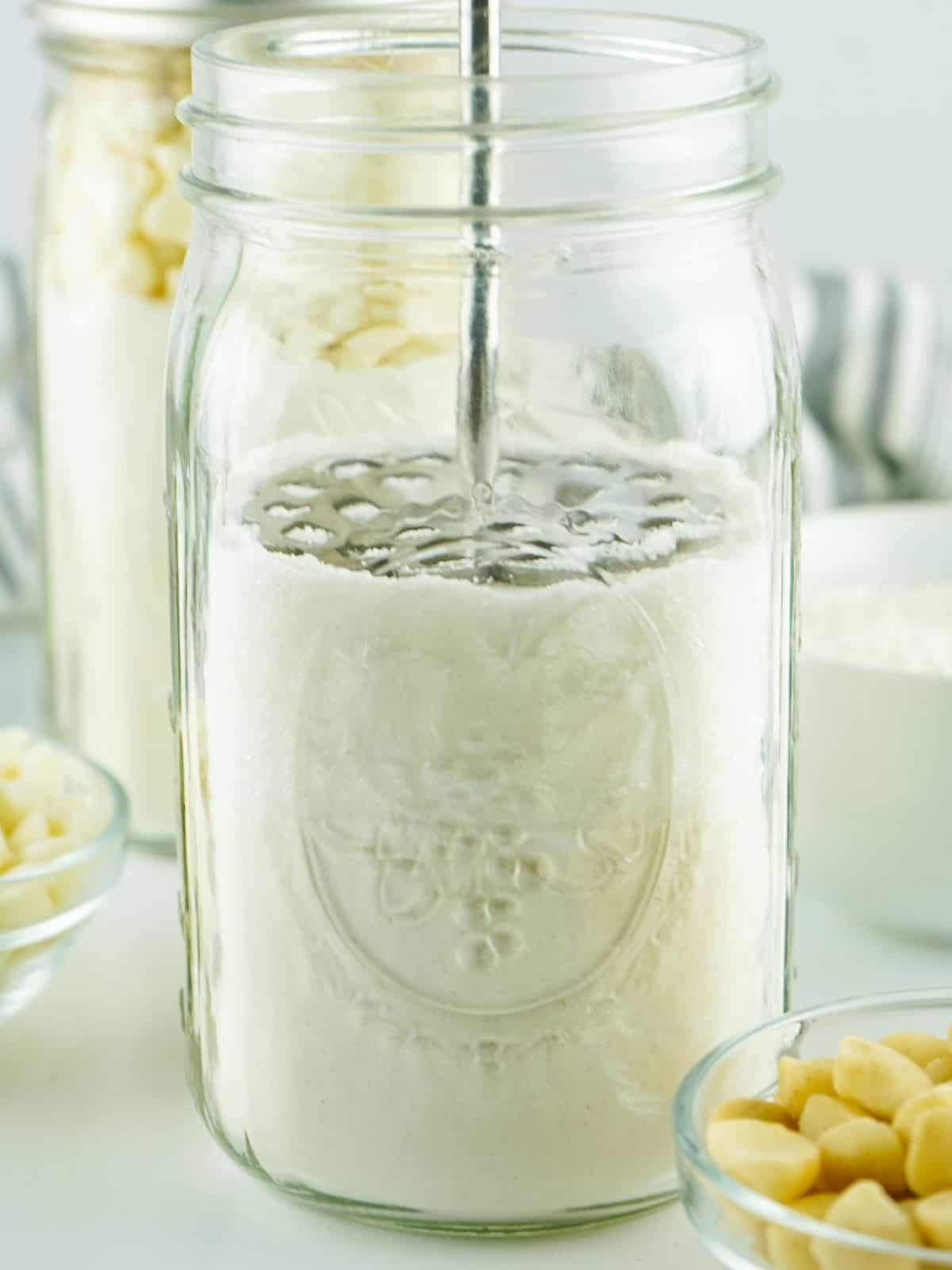 press dry ingredients together in mason jar.