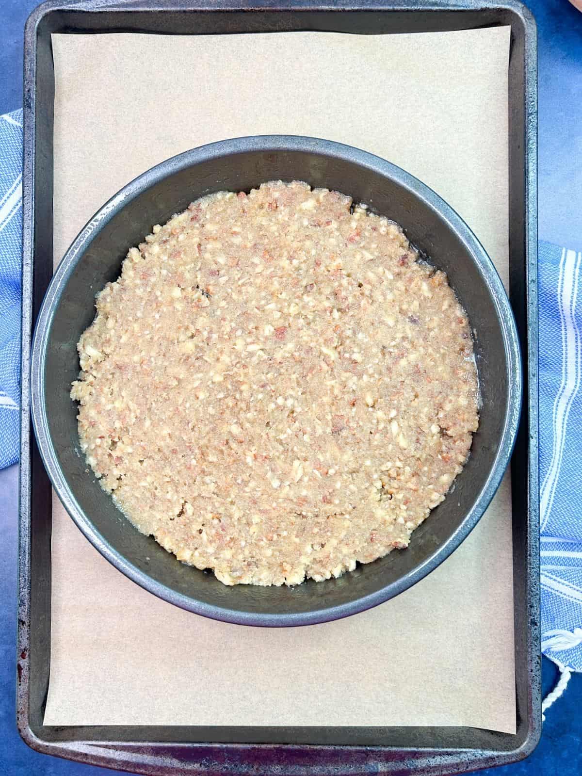 pecan brown sugar topping pressed into bottom of cake pan.