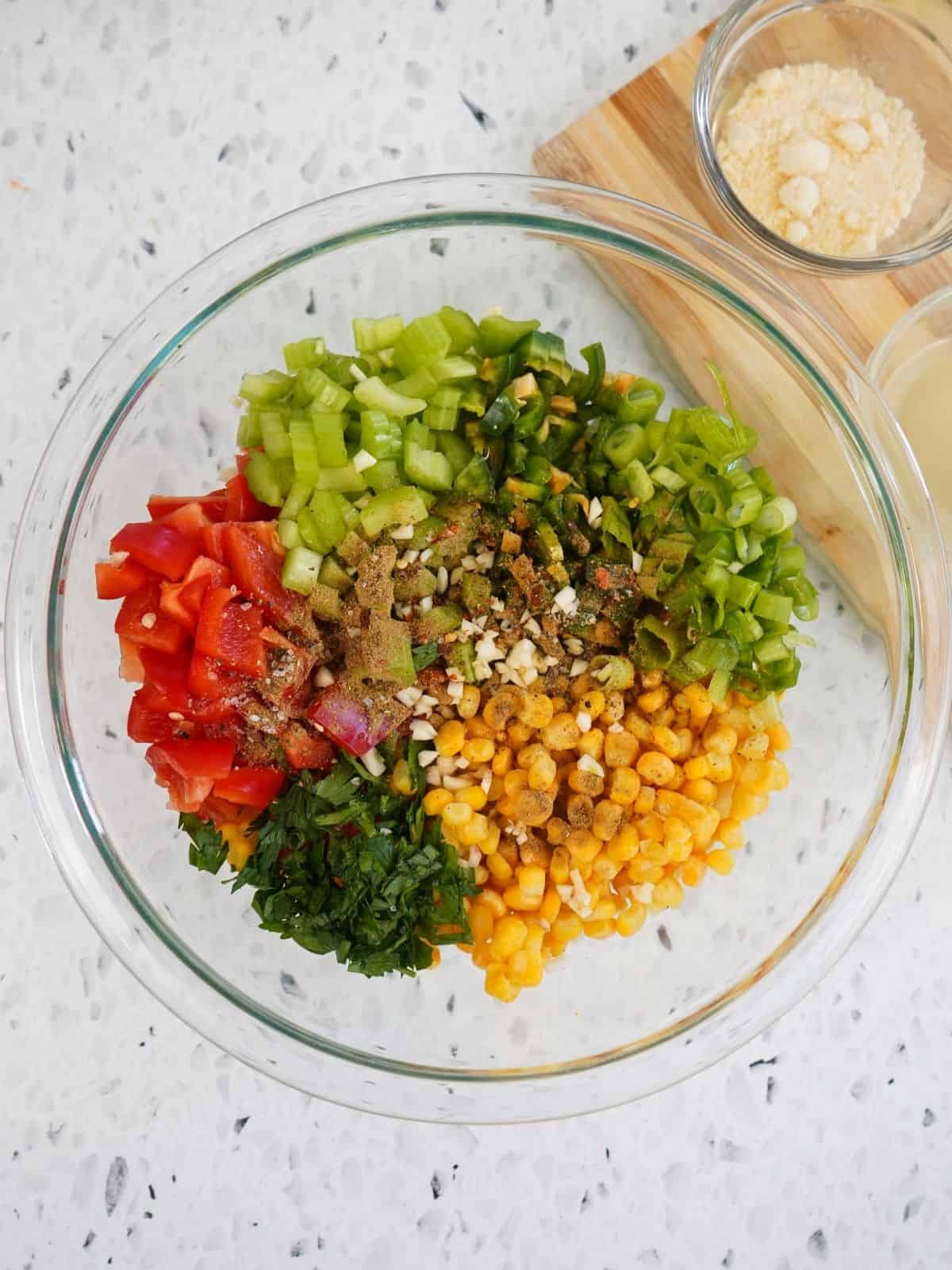 Ingredients for corn fiesta salad in bowl.