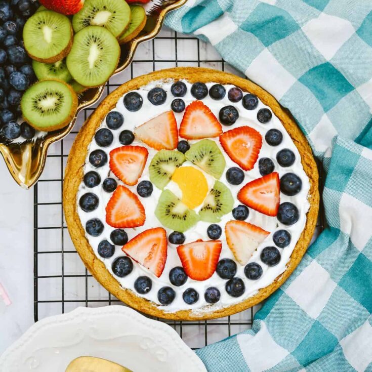 Fruit Pizza made with sugar cookie dough and Cool Whip Topping.