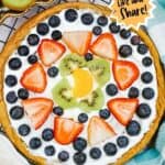 Pizza made with sugar cookie dough and assorted fruit Pinterest Photo.