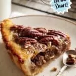Homemade Pecan Pie slice on plate Pinterest photo.